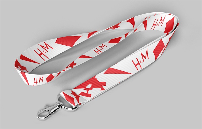 Rood-wit lanyard-concept met H&M-typografie en geometrische vormen.