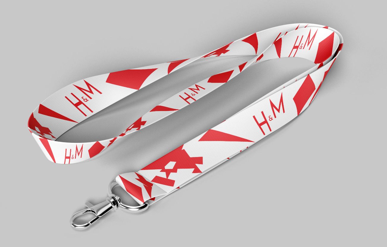Rood-wit lanyard-concept met H&M-typografie en geometrische vormen.